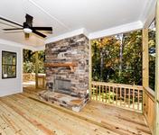 Colorful Outdoor FP  in home built by Atlanta Home Builder Waterford Homes